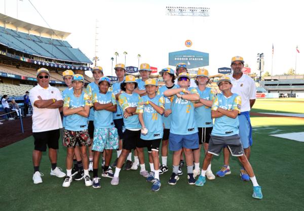 The Little League World Series champions from El Segundo pose before the start of a baseball game between Arizona Diamondbacks and Los Angeles Dodgers at Dodger Stadium in Los Angeles on August 29, 2023. (Kevork Djansezian/Getty Images)