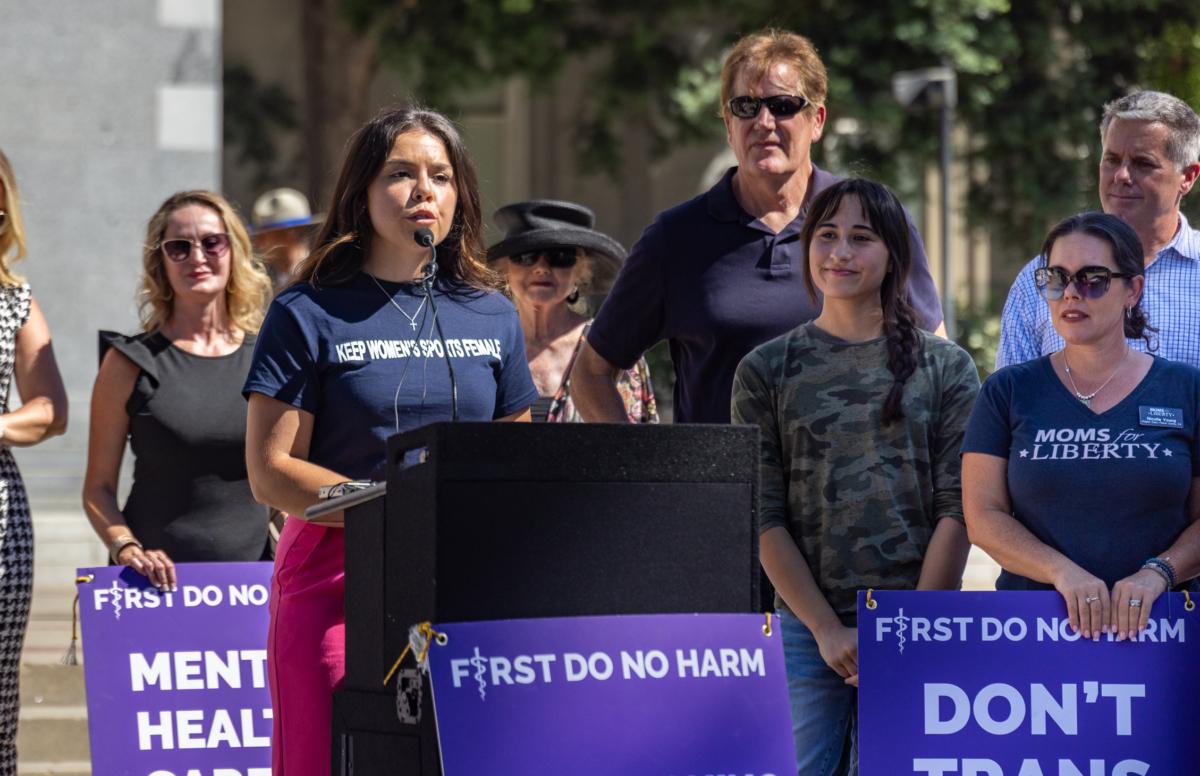 Sophie Lorey, a former college soccer player for Vanguard University in Costa Mesa, Calif., speaks out against boys identifying as transgender playing in girls’ sports and using their locker rooms, at the California State Capitol building in Sacramento, Calif., on Aug. 28, 2023. (John Fredricks/The Epoch Times)