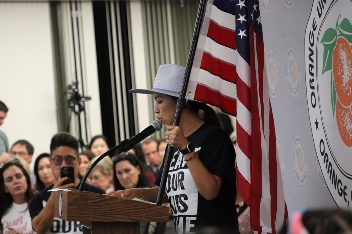 A supporter of a school district policy to notify parents when their child wishes to identify as transgender speaks during a public comment session at an Orange Unified School Board meeting in Orange, Calif., on Sept. 7, 2023. (Mei Lee/The Epoch Times)