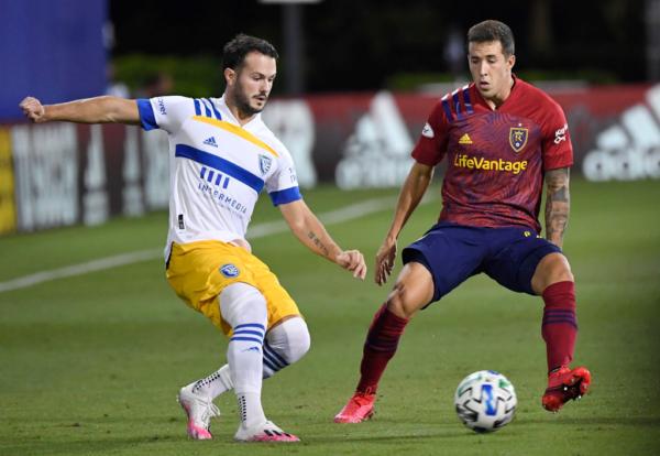 Milan Iloski (23) of Real Salt Lake fights for the ball with Valeri Kazaishvili (11) of San Jose Earthquakes during a round of 16 match of the MLS Is Back Tournament between San Jose Earthquakes and Real Salt Lake at ESPN Wide World of Sports Complex in Reunion, Fla., on July 27, 2020. (Douglas P. DeFelice/Getty Images)