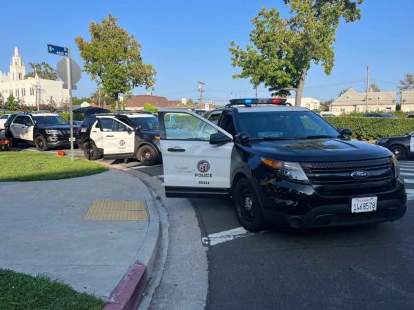 Police cars outside an event attended by Democratic presidential candidate Robert F. Kennedy Jr. at Wilshire Ebell Theatre in Los Angeles on Sept. 15, 2023. (Provided to The Epoch Times)