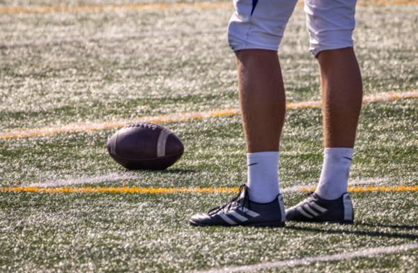 Students play a high school game of football in Irvine, Calif., on Sept. 14, 2023. (John Fredricks/The Epoch Times)