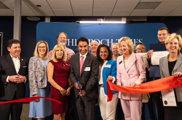 The Epoch Times Southern California edition's General Manager Siyamak Khorrami (C) is joined by Orange County's local leaders at a ribbon-cutting ceremony celebrating the grand opening of the newspaper's new office in Irvine, Calif., on Sept. 19, 2023. (John Fredricks/The Epoch Times)
