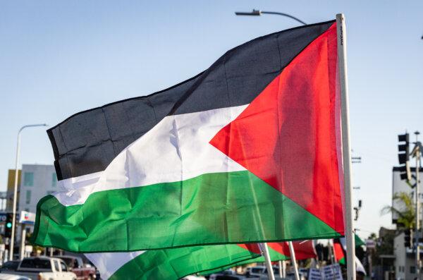 Protesters wave Palestinian flags in support of the state of Palestine in Los Angeles, Calif., on Oct. 12, 2023. (John Fredricks/The Epoch Times)