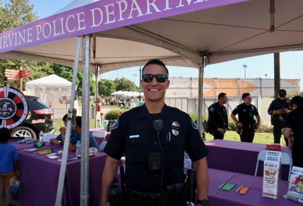Irvine Police Department Detective Alex Mena at the 22nd annual Irvine Global Village Festival in Irvine, Calif., on Oct. 14, 2023. (Sophie Li/The Epoch Times)