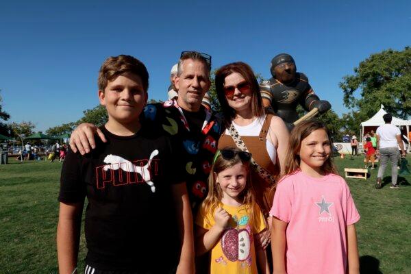 Downey resident Mark Newmanand his family participate at the 22nd annual Irvine Global Village Festival in Irvine, Calif., on Oct. 14, 2023. (Sophie Li/The Epoch Times)