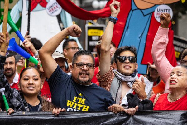 Hotel workers march in the streets of downtown Los Angeles on Oct. 25, 2023. (John Fredricks/The Epoch Times)