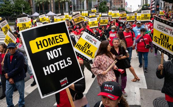 Hotel workers march in the streets of downtown Los Angeles on Oct. 25, 2023. (John Fredricks/The Epoch Times)