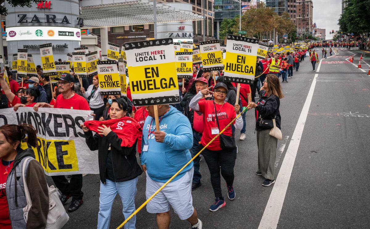 Hotel workers march in the streets of downtown Los Angeles on Oct. 25, 2023. (John Fredricks/The Epoch Times)