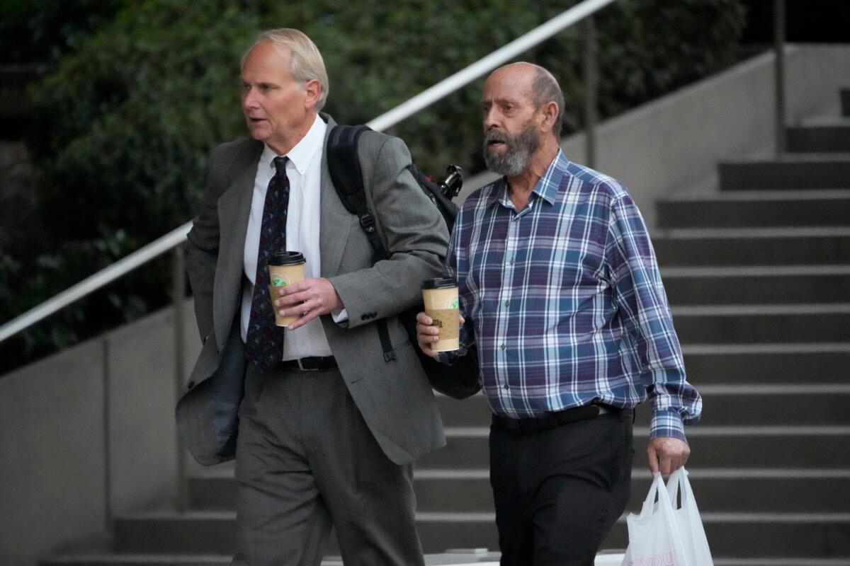 Defendant, Conception's captain Jerry Boylan (R), arrives in federal court in Los Angeles on Oct. 25, 2023. (Damian Dovarganes/AP Photo)