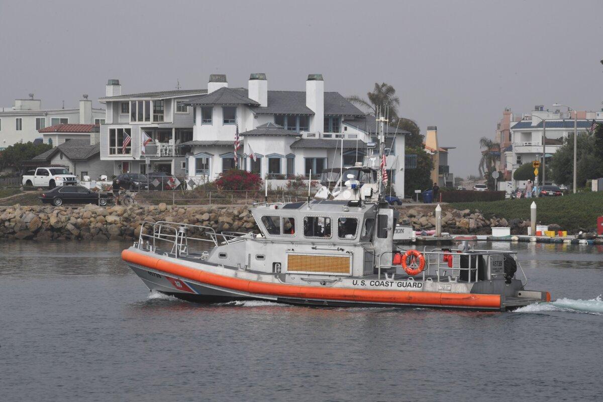 A Coast Guard crew leaves the U.S. Coast Guard Station Channel Islands as they head out to the scene of the boat that burned and sank off the Santa Cruz islands early in the morning at the Coast Guard base in Oxnard, Calif., on Sept. 2, 2019. (Mark Ralston/AFP via Getty Images)