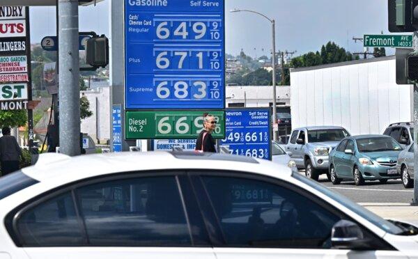 A sign displays the price of gas at more than $6 per gallon at a gas station in Alhambra, Calif., on Sept. 18, 2023. (Frederic J. Brown/AFP via Getty Images)