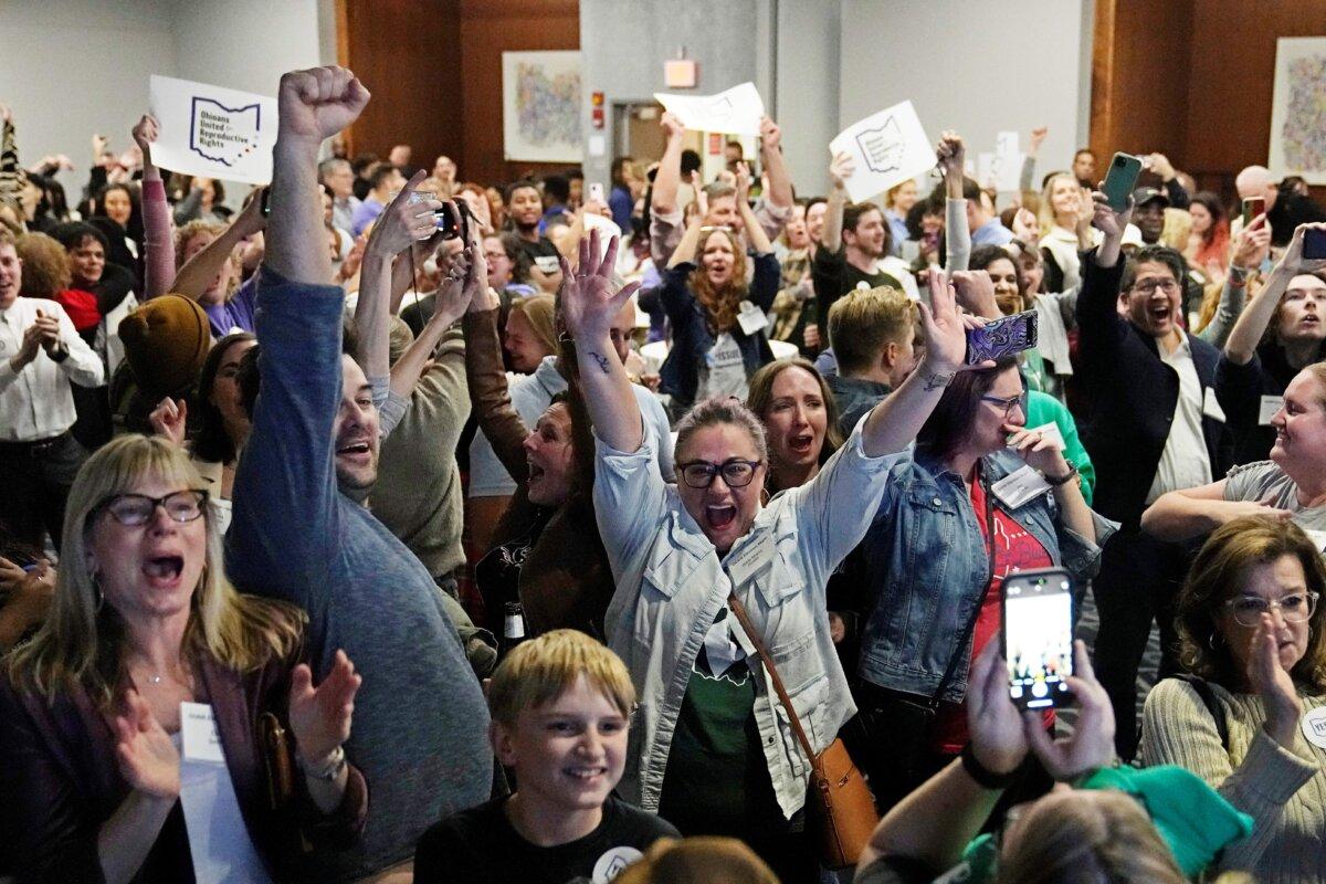 Issue 1 supporters cheer as they watch election results in Columbus, Ohio, on Nov. 7, 2023. (Sue Ogrocki/AP Photo)