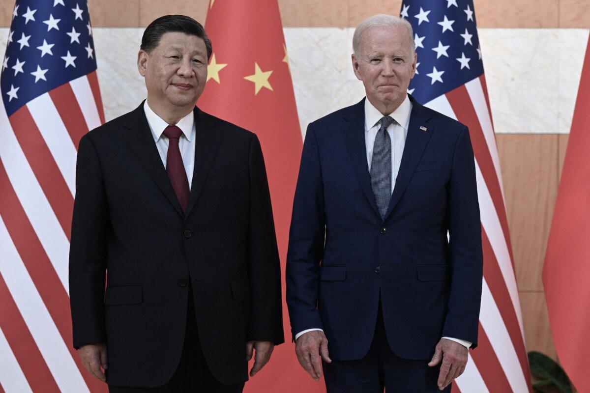 U.S. President Joe Biden and China's leader Xi Jinping meet on the sidelines of the G20 Summit in Nusa Dua on the Indonesian resort island of Bali on Nov. 14, 2022. (Saul Loeb/AFP via Getty Images)