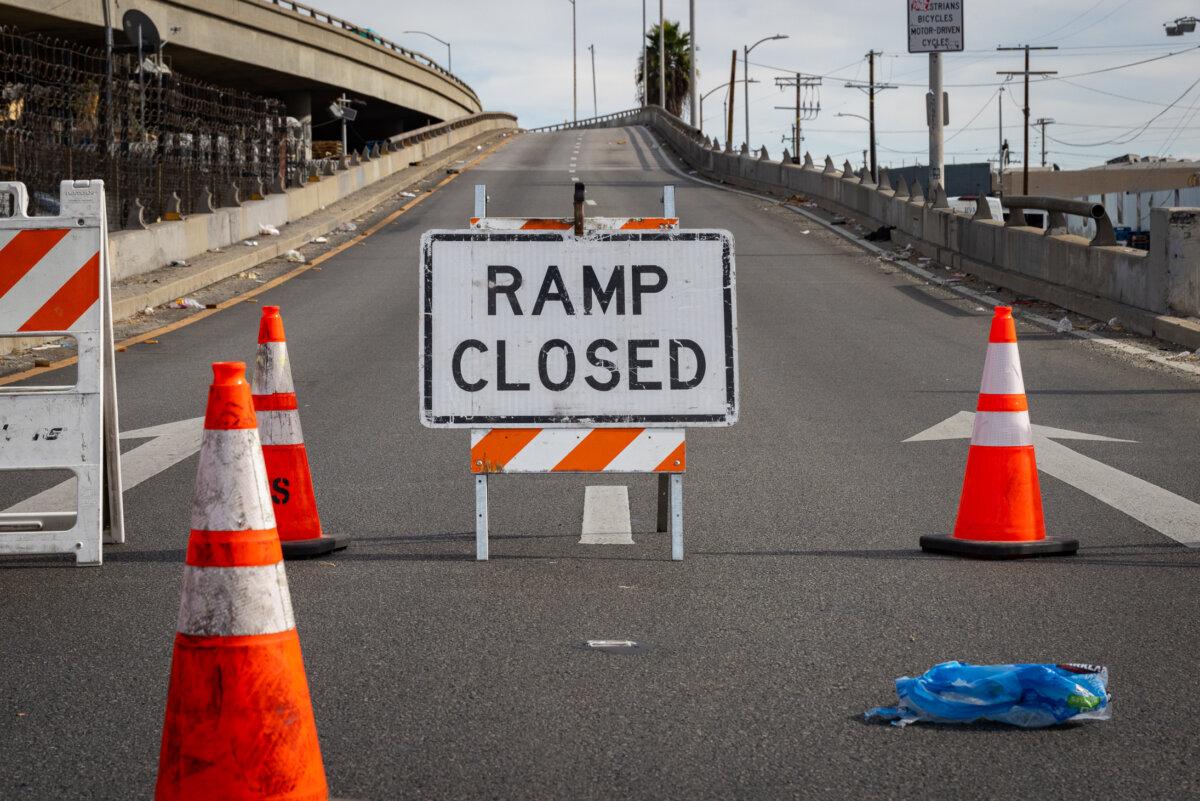 A freeway onramp is closed off after a temporary closure of the 10 freeway in Los Angeles on Nov. 13, 2023. (John Fredricks/The Epoch Times)
