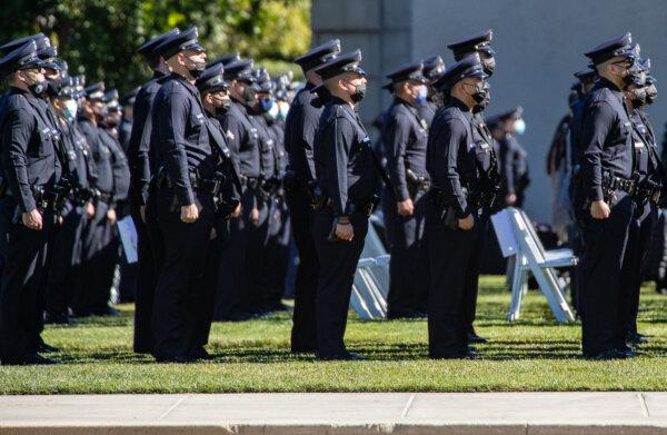 Los Angeles Police Department (LAPD) officers gather for the funeral service of a police officer in a file photo. (John Fredricks/The Epoch Times)