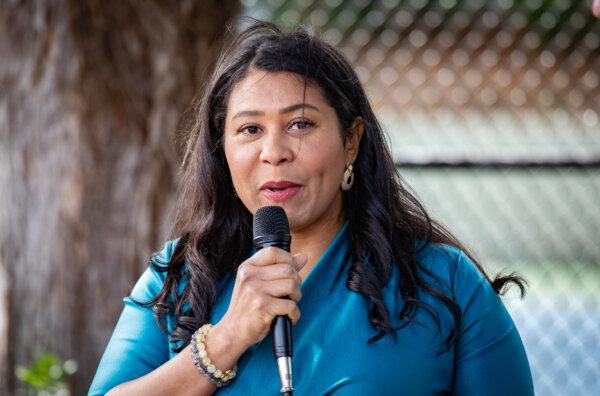 San Francisco Mayor London Breed speaks with local residents on Oct. 22, 2022. (John Fredricks/The Epoch Times)