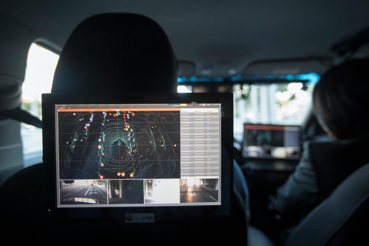 Data from lidar, radar, cameras, and GPS units inside a car equipped with an autonomy system during AutoMobility LA at the Los Angeles Convention Center in California, on Nov. 17, 2016. (David McNew/Getty Images)
