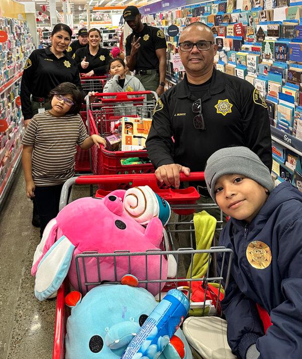 Regional law enforcement accompanied 300 specially selected third graders at the annual "Shop with a Cop" event in San Diego County on Dec. 2, 2023. (Courtesy of the County of San Diego)