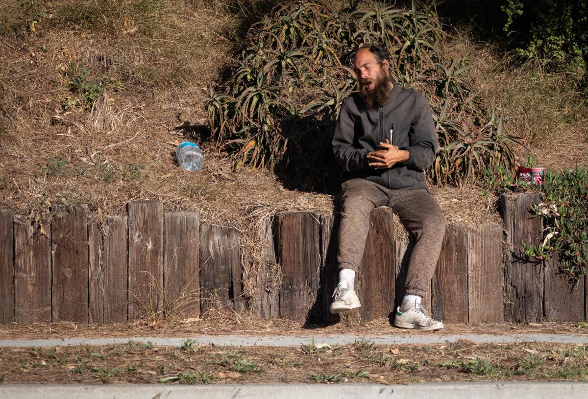 A homeless man in Santa Monica, Calif., on Dec. 8, 2023. (John Fredricks/The Epoch Times)
