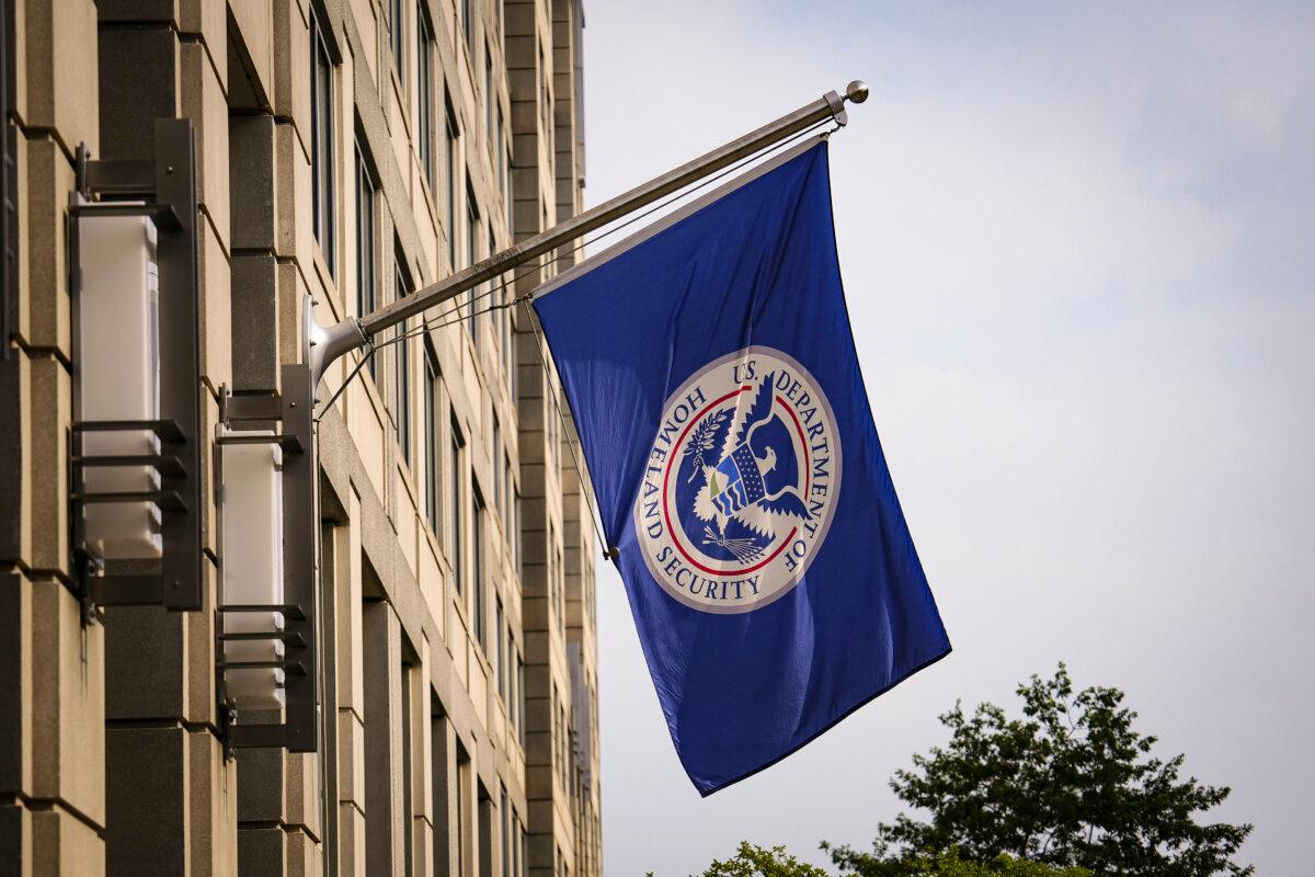 The Department of Homeland Security flag flies at the Immigration and Customs Enforcement building in Washington on June 28, 2023. (Madalina Vasiliu/The Epoch Times)
