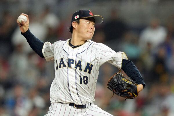 Yoshinobu Yamamoto (18) of Team Japan pitches in the eighth inning against Team Mexico during the World Baseball Classic Semifinals at loanDepot Park in Miami, Fla., on March 20, 2023. (Eric Espada/Getty Images)