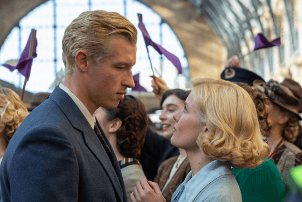 Joe Rantz (Callum Turner) and girlfriend Joyce Simdars (Hadley Robinson) say their goodbyes as he leaves for the Olympic games, in “The Boys in the Boat.” (Laurie Sparham/Metro-Goldwyn-Mayer Pictures)