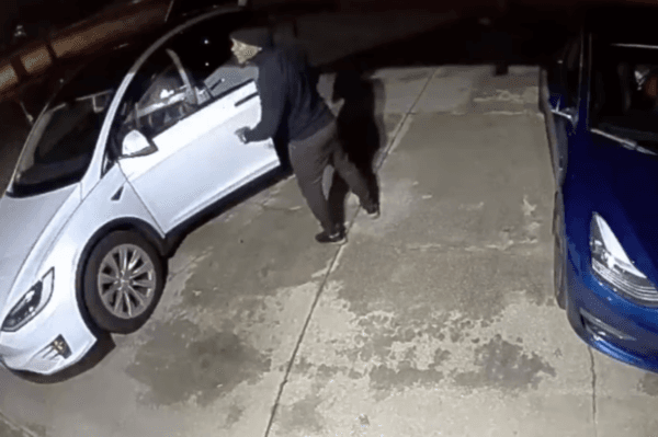 A follow-home robbery suspect is seen in home security footage in Fullerton, Calif., on Dec. 22, 2023. (Facebook/Priyanka Wali screenshot via The Epoch Times)