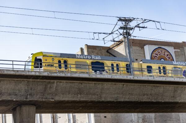 An LA Metro train travels through downtown Los Angeles on Jan 2, 2024. (John Fredricks/The Epoch Times)