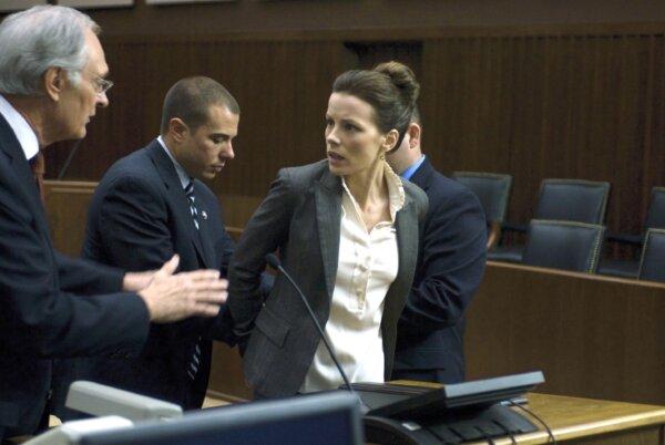 Albert Burnside (Alan Alda) and Rachel Armstrong (Kate Beckinsale) face the consequences for truthful reporting, in "Nothing but the Truth." (Yari Film Group)