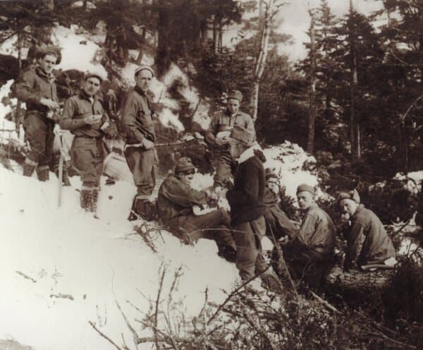 The men of the 191st Civilian Conservation Corps pose for a photograph in the winter of 1933. Paul Barquin (2nd L) was the first to ski a cut trail<span style="color: #ff0000;"> </span>in the state of Vermont. (Courtesy of Stowe Mountain Resort)