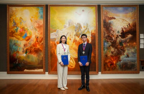 Hung-Yu Chen (L), Yuan Li (not pictured), and Shao-Han Tsai, won the silver award for their triptych "The Infinite Grace of Buddha" at the Sixth NTD International Figure Painting Competition on Jan. 18, 2024, at the Salmagundi Club in New York City. Each artist painted one of the panels. (Samira Bouaou/The Epoch Times) "