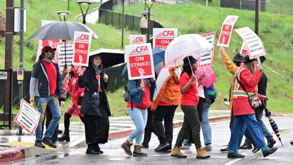 Faculty members and other employees at California State University Los Angeles stop working for the start of a five-day strike at Cal State LA in Los Angeles on Jan. 22, 2024. (Frederic J. Brown/AFP via Getty Images)