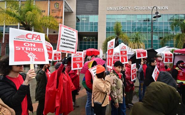 Faculty members and other employees at California State University Los Angeles stop working for the start of a five-day strike at Cal State LA in Los Angeles on Jan. 22, 2024. (Frederic J. Brown/AFP via Getty Images)