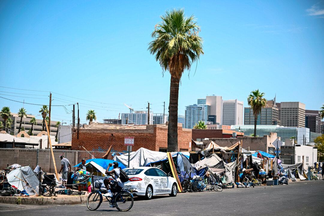 A glimpse of how “The Zone,” a vast homeless encampment with hundreds of people, looked before it was cleared in late 2023, in Phoenix on July 18, 2023. (Patrick T. Fallon/AFP via Getty Images)