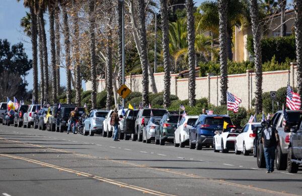 Drivers prepare to join a convoy in protest of the open U.S. borders, in San Ysidro, Calif., on Feb. 3, 2024. (John Fredricks/The Epoch Times)