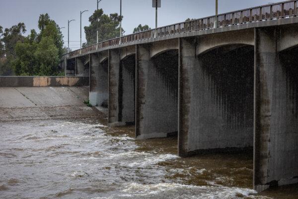 The Los Angeles River fills with rain water after a recent storm in Long Beach, Calif., on Feb. 6, 2024. (John Fredricks/The Epoch Times)