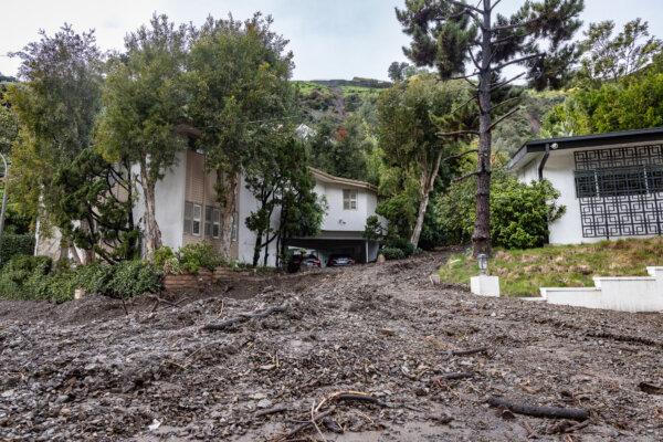 Mudslides cover roads after heavy rain storms hit the city of Beverly Hills, Calif., on Feb. 6, 2024. (John Fredricks/The Epoch Times)