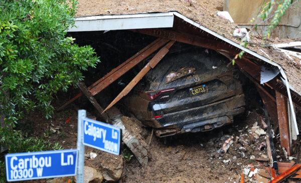 A view of mudslide damage which destroyed a home as a powerful long-duration atmospheric river storm, the second in less than a week, continues to impact Southern California in Los Angeles on Feb. 5, 2024. (Mario Tama/Getty Images)