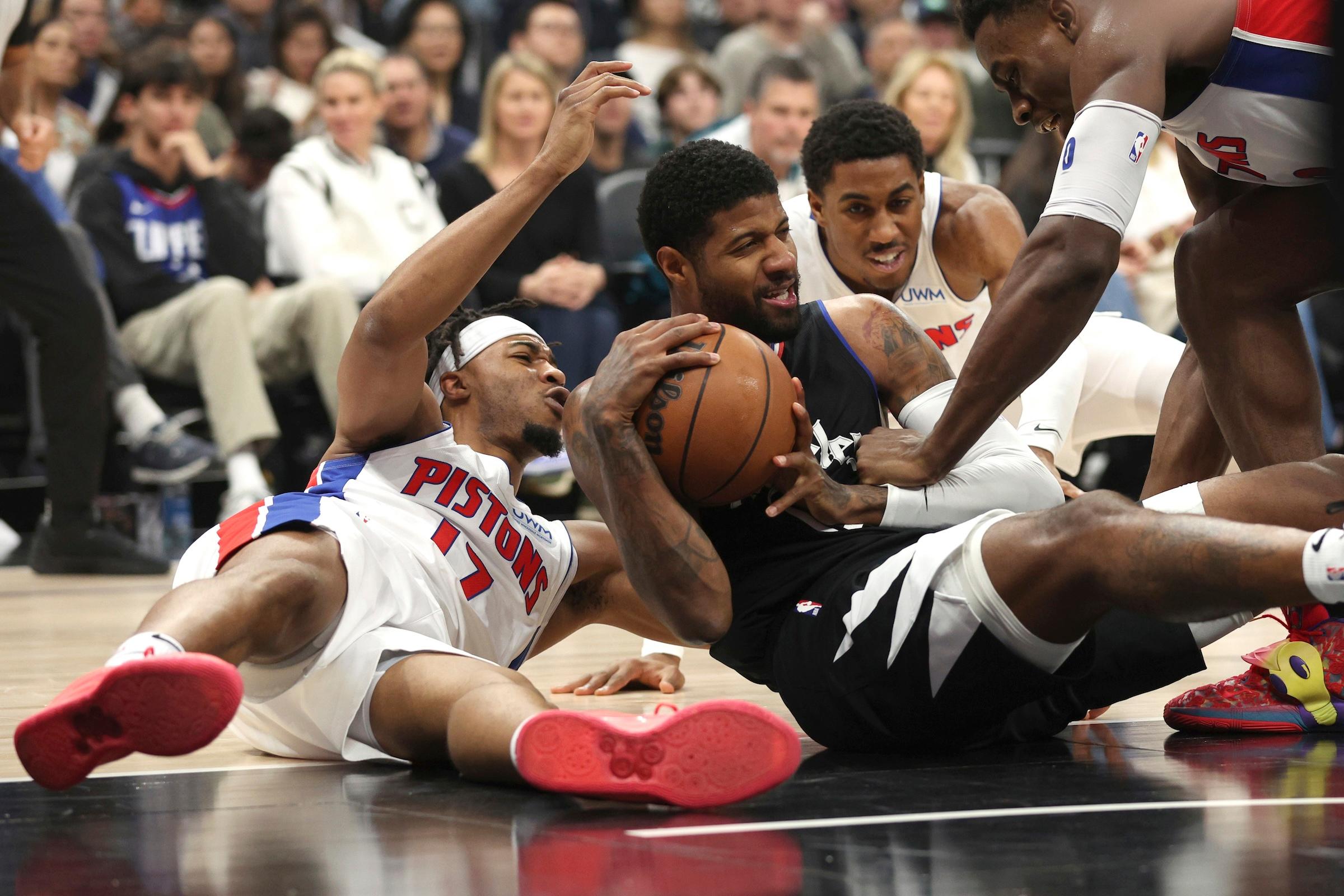 George and Leonard Combine for 57 Points in Rallying Clippers Past Pistons 112–106