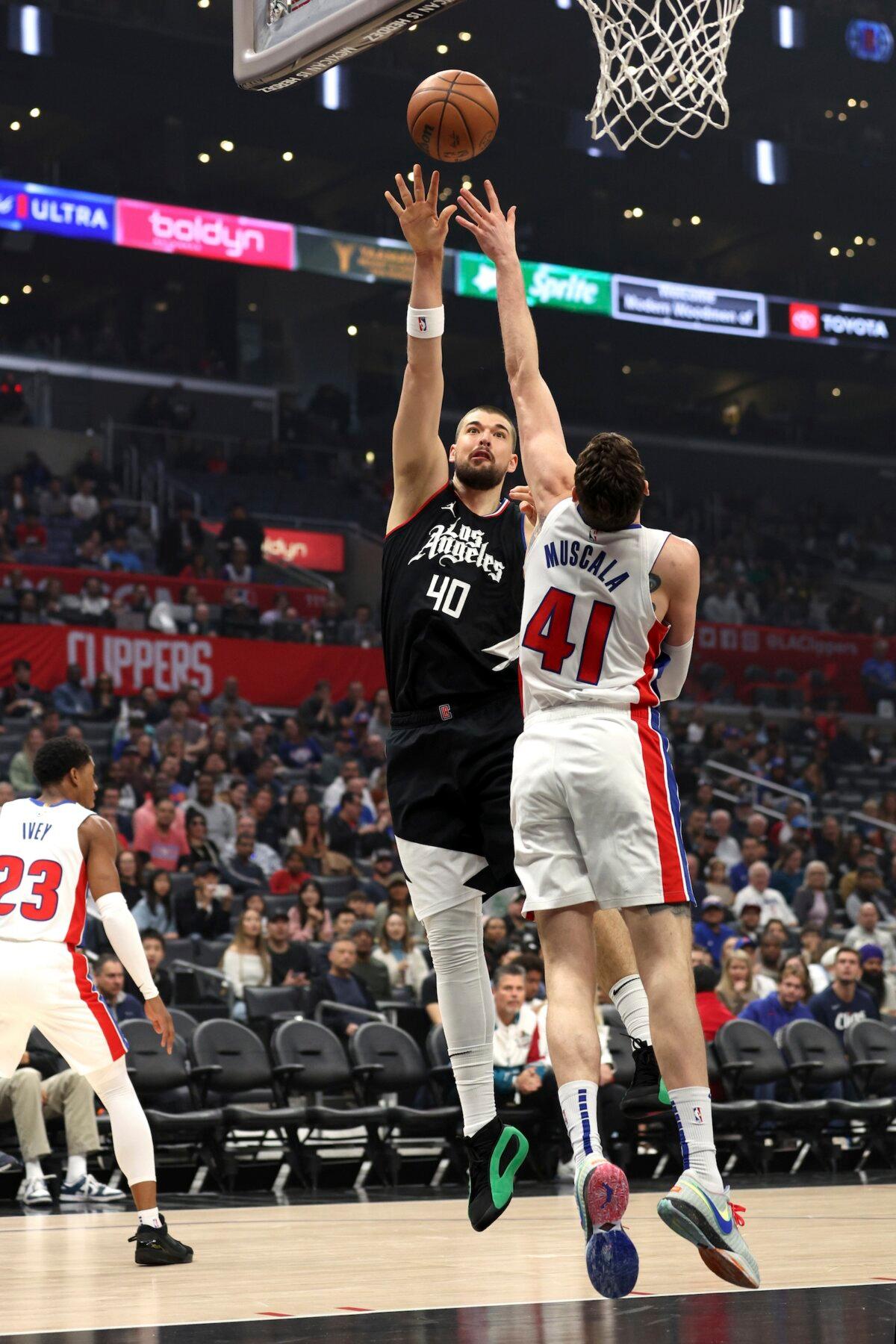 Los Angeles Clippers center Ivica Zubac (40) shoots over Detroit Pistons center Mike Muscala (41) during the first half of an NBA basketball game in Los Angeles on Feb. 10, 2024. (Raul Romero Jr./AP Photo)