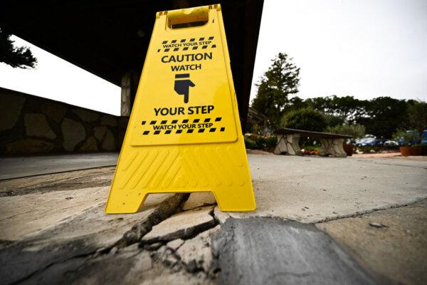 A cracked walkway outside Wayfarers Chapel, which was closed due to land movement after heavy rains, in Rancho Palos Verdes, Calif., on Feb. 16. (Patrick T. Fallon/AFP via Getty Images)