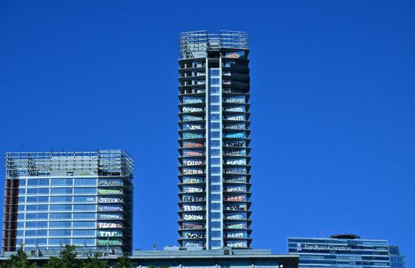 Several floors of a high-rise covered in graffiti are seen downtown Los Angeles on Feb. 8, 2024. (Frederic J. Brown/AFP via Getty Images)
