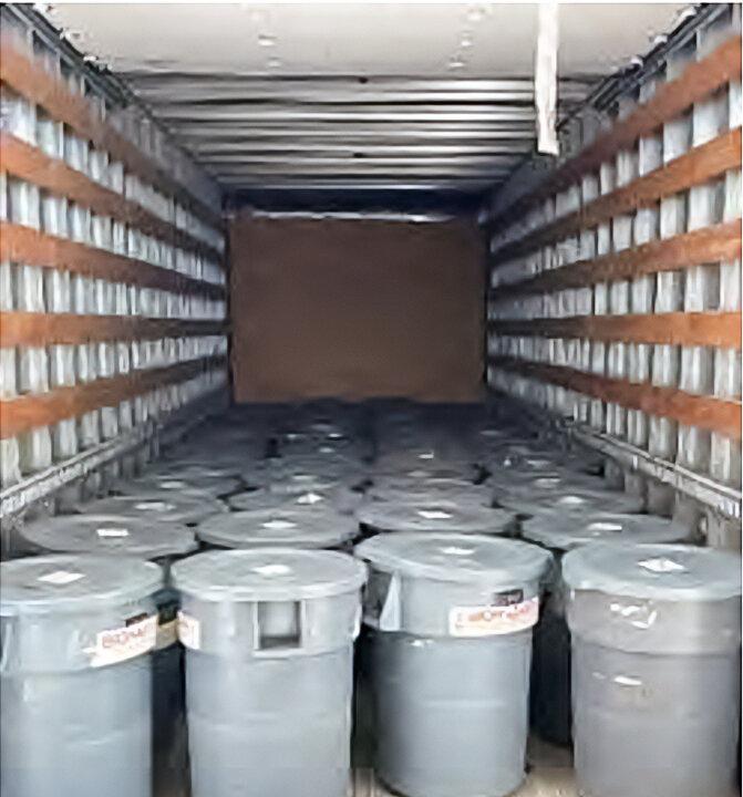 More than 40 trash-can-sized containers of biohazardous waste were removed from the Chinese biolab after its abatement. Officials had to dispose of more than 103 tons of general waste and 448 gallons of medical and biological waste. (City of Reedley)