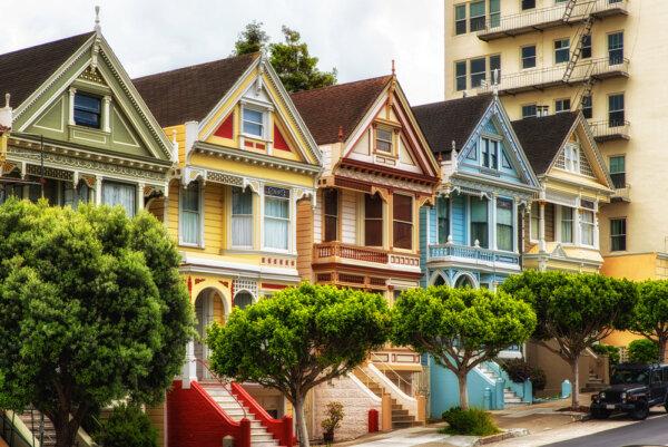 The 1970s brought bright colors to the facades of the homes on Steiner Street in San Francisco, California. San Francisco, San Jose, Los Angeles, and San Diego were the four metro areas in the U.S. with the biggest share of million-dollar homes. (Atosan/Shutterstock)