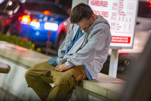A drug user in Stanton, Calif., on Feb. 26, 2024. (John Fredricks/The Epoch Times)