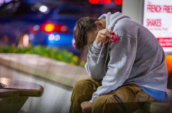 A man high on fentanyl in Stanton, Calif., on Feb. 26, 2024. (John Fredricks/The Epoch Times)