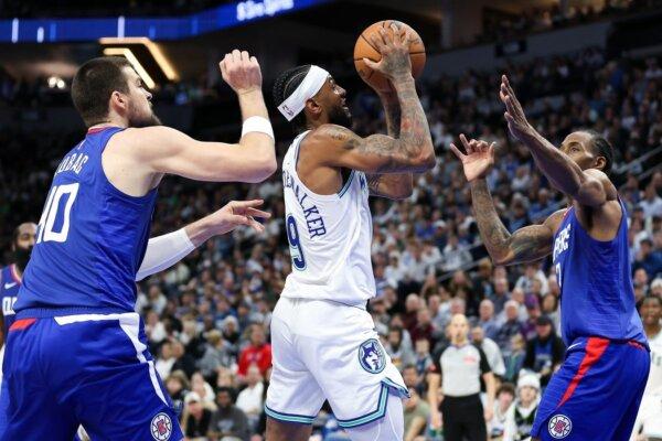 Minnesota Timberwolves guard Nickeil Alexander-Walker (9) shoots as LA Clippers center Ivica Zubac (40) and LA Clippers forward Kawhi Leonard (2) defend during the first half in Minneapolis on March 3, 2024. (Matt Krohn/USA TODAY Sports via Field Level Media)