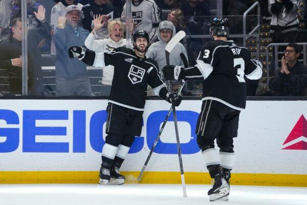 Los Angeles Kings center Phillip Danault celebrates his goal with defenseman Matt Roy during the second period of an NHL hockey game against the New Jersey Devils in Los Angeles on March 3, 2024. (Ryan Sun/AP Photo)