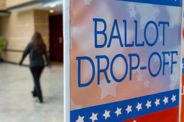 Voters prepare to cast their ballots in Irvine, Calif., on March 5, 2024. (John Fredricks/The Epoch Times)